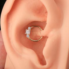 Description: If you're looking for a simple but fashionable selection for your septum piercing then you will love this 16 gauge CZ septum ring and daith earring. Safe Material: The hoop ring is made of 14KT gold, 100% lead& nickel-free, and hypoallergenic for wearing. Standard Size: The bar thickness is 16G(1.2mm), and the inner diameter is 8mm, 10mm. Please choose carefully according to your piercing size. Multiple Usage: It works so well in multiple piercings including daith, helix, snug, trag Tragus Hoop, Conch Hoop, Piercing Septum, Helix Hoop