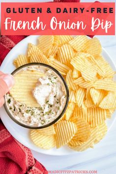 a white plate topped with chips and dip