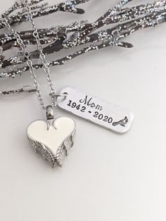 Heart Urn - Personalized Urn Jewelry - Cremation Urn - Ash Urn Pendant - Ashes Necklace - Memorial Jewelry - Keepsake Urn - Loss Necklace This beautiful stainless steel heart urn is the perfect memorial piece. It comes with a tag personalized with one name and year to year dates of your choice. Beautiful cardinal design on the tag. All urns hold a small pinch of ash. Each urn comes with a funnel kit and detailed instructions.  Let me make you something absolutely exquisite! I accept all custom ideas and will work with you to make the perfect gift for any occasion. Please read the shop announcements for important info! ~production time ~production info ~shipping info ~refund info All items are handmade. Made by me, not a machine. To view other items in my shop, please visit https://www.etsy Cardinal Design, Ashes Necklace, Urn Pendant, Urn Jewelry, Keepsake Urns, Custom Ideas, Keepsake Jewelry, Personalized Tags, Memorial Jewelry