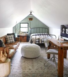 a living room filled with furniture and a flat screen tv