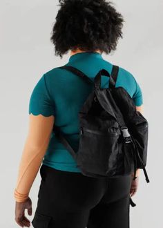 A backpack for all seasons and all phases of life—for school, for work, for life in general. Two exterior zip pockets keep things easily accessible, and an interior sleeve keeps your laptop secure. 13" interior laptop sleeve Expandable drawstring and buckle closure Two exterior and one interior zippered pockets Measures 14 ½" × 14" × 6 30" adjustable logo straps Recycled heavyweight nylon exterior, recycled ripstop nylon interior Machine washable Sport Backpack, Cool Clothing, Backpack Sport, Scarf Men, Mens Skin Care, Black Backpack, Laptop Sleeve, Sock Shoes, Laptop Sleeves