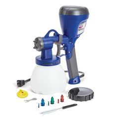 a paint sprayer and tools are shown on a white background