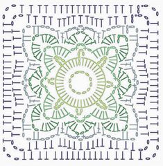 a cross - stitch pattern with green and blue designs on white paper, which has an intricate design in the center