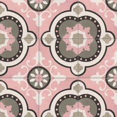 a pink and gray tile with an ornate design