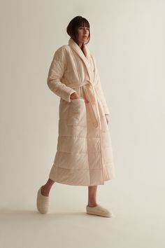 Our Unisex Sierra Robe is so soft and cozy, it will feel like you're laying underneath your favorite blanket. Made from quilted cotton-jersey, it's lightly padded for added warmth and has a relaxed shape that can be easily cinched by the detachable waist belt. Stow your mobile phone in the large front patch pocket. 100% Cotton / Poly fill Length 51" from HPS Meant for a relaxed easy fit Side seam pockets Large front pocket Cut for a relaxed fit Use the tie belt to cinch in at the waist Quilted Robe, Wardrobe Solutions, Chill Fits, Quilted Duvet, Pearl Pink, Wearable Blanket, Sleepwear Robe, Sleepwear Women, Tie Belt