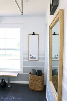 a bathroom with a sink and mirror in it