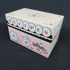 a pink box that has some type of food on it's lid and bottom