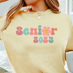 Comfort Colors shirt, Aesthetic, Class of 2023 shirt, 2023 Graduate, College Senior, High School Senior,Floral senior shirt, Gift for Her, Senior 2023 sweatshirt, Senior 2023 shirt, Aesthetic, back to school ♥ GREAT GIFT IDEAS: Birthday, Halloween, Thanksgiving, Christmas, New year, Father's day, Mother's day, Anniversary gifts, Valentine's Day, Easter, Graduations, or just to show someone you care about them. We even carry Teacher's gifts, Bridal gifts and more    We offer Short sleeve unisex T Senior Class Tshirts 2023, Relaxed Fit Shirt For College Spring Season, Relaxed Fit Shirt For College In Spring, Spring School T-shirt With Slogan, Spring Slogan T-shirt For School, Slogan T-shirt For School In Spring, Spring School Tops With Funny Print, Funny Print Tops For School In Spring, Spring School Shirt With Text Print