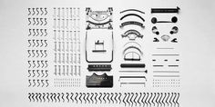 an assortment of different types of objects on a white surface with black and white lines