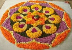 a colorful flower arrangement on the ground