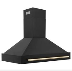 a black stove hood with gold trim