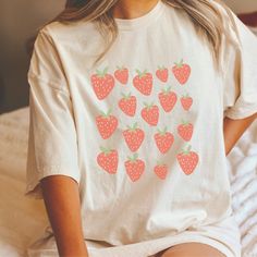 This strawberry tshirt makes a totally unique strawberry gift for strawberry pickers, gardeners, and just any strawberry lover in your life! This strawberry crewneck is the perfect cottage core aesthetic fruit shirt for spring, summer, and more! Grab this tee today while it's on sale! Delivery Times: ◦ Production: 1 business day on average (maximum: 7) ◦ Shipping: 2 business days on average (maximum: 3) Unisex Fit: ◦ Extra soft, preshrunk unisex t-shirt ◦ Women: Semi-fitted, laidback, rollable, Strawberry Tshirt, Strawberry Clothing, Baby Pineapple, Aesthetic Fruit, Funny Science Shirts, Strawberry Aesthetic, Lesbian Shirts, Lesbian Gifts, Strawberry Gifts