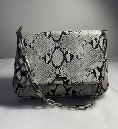 Nine West evening bag Snake Print Genuine Leather Bag Silver Chain Handle | eBay Formal Clutch Shoulder Bag With Chain, Formal Crossbody Evening Bag With Chain, Formal Clutch Shoulder Bag With Chain Detail, Formal Shoulder Bag With Chain, Formal Shoulder Evening Bag With Chain Strap, Evening Satchel Shoulder Bag With Chain, Formal Crossbody Clutch With Chain, Evening Shoulder Bag With Chain Pouch, Formal Chain Pouch Shoulder Bag