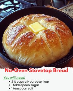 a loaf of bread sitting in a pan on top of a stove