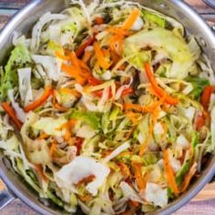 a large pot filled with lots of vegetables