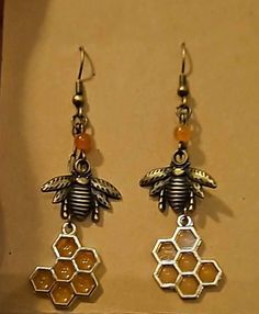 In honor of our "Honey Man" Grandfather, who recently passed on, these bee-themed earrings celebrate his memory. Bottles contain his real, raw honey. Honeybee Jewelry, Honey Earrings, Honey Necklace, Tiny Bee Earrings, Honey Bee Earrings, Honey Jewelry, Bee Earrings, Bee Theme, Antique Earrings