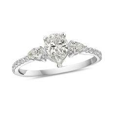 a pear shaped diamond engagement ring with three stones on the band and shoulders, set in 18k white gold