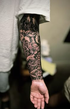 a person with a tattoo on their arm