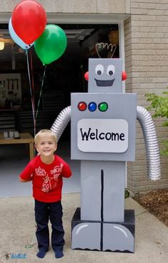 Cardboard Robot Robotic Theme Decoration, Robot Theme Classroom, Techfest Decoration Ideas, Robot Theme Party, Robot 3rd Birthday Party, Robot Birthday Theme, Robot Party Decorations, Robot Centerpieces, Cardboard Robot Diy