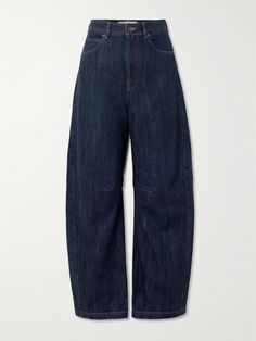 Loewe's jeans are in line with multiple trends this season, including barrel-shaped legs and darker washes. They're made from inky denim traced with contrasting stitching and sit high on the waist. The signature 'Anagram' is bleached onto the hip, so you'll want to tuck in your tops to show it off. Loewe Jeans, Winter Work Wear, Contrasting Stitching, Minimal Classic, Winter Cardigan, Sport Swimwear, Fall Winter 2024, Shearling Jacket, Dress And Heels