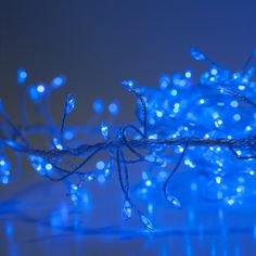 a bunch of blue lights that are on a table