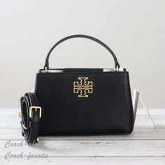 Nwt Tory Burch Britten Micro Satchel Leather Crossbody In Black Details: Black Pebbled Leather Magnetic Snap Closure Adjustable Detachable Crossbody Strap Approx. Measurements: 5" X 8" X 3" In Smoke Free Home!! All Items Are Guaranteed 100% Authentic And Brand New ! Tory Burch Britten, Tory Burch Crossbody Bag, Tory Burch Purse, Tory Burch Crossbody, Tory Burch Wallet, Small Leather Bag, Convertible Crossbody Bag, Tory Burch Handbags, Tory Burch Bags