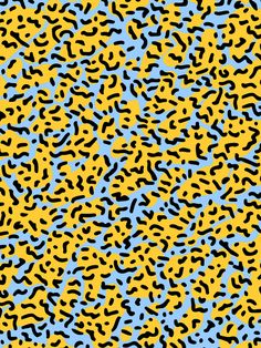 a yellow and blue pattern with black dots