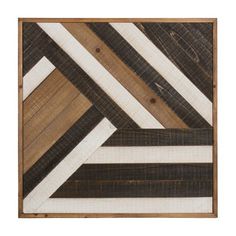 a wooden wall hanging with several different colored strips on the bottom and one white strip in the middle