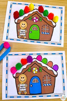 two gingerbread house cut outs with pom - poms