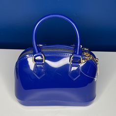 Blue Jelly Satchel Bag, Can Be Worn As Crossbody With Gold Chains Or Carried As Handbag. Blue Shoulder Bag With Zipper For Summer, Trendy Blue Satchel For Summer, Trendy Blue Crossbody Satchel, Chic Blue Satchel With Zipper Closure, Trendy Blue Evening Bag, Elegant Blue Summer Bags, Blue Summer Bags With Zipper Closure, Blue Summer Satchel With Adjustable Strap, Summer Blue Bags With Zipper Closure