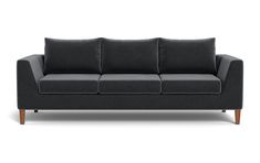 a gray couch with three pillows on it's back and arms, against a white background