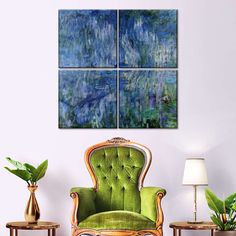 a green chair sitting in front of a wall with paintings on it's sides