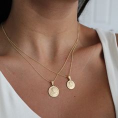 "Virgin Mary Medallion Necklace . . * Pendants Diameters:      Small (12mm)    -    Medium (16mm) * Chain is included ( 1MM Rolo Chain) * Stamp: Real 14k Gold * Never gold filled or plated * 1-Day Shipping * Packaged With Free Gift Box . . . If you have any questions, just hit the \"Message the Seller\" button ( bottom right of the page) and we will get back to you within a few hours. . . . Mailed in a cute white package great for gifting. . . . Check our Social Media @Talajewel, and let's be friends! . . . . Made in USA, necklace with 1mm Box Chain Medal Round, 14K Solid Gold Coin Necklace, Medallion Necklace, Virgin Mary Necklace, 14k gold necklace From Italy, 14K Gold disk, Can be worn with other necklaces, great for layers. A Perfect 14K Gold gift. easters gift, Christmas gift, mothers Gold Virgin Mary Necklace, Mary Necklace, Virgin Mary Necklace, Necklace Christian, Gold Coin Necklace, Gold Disc, Catholic Quotes, Necklace Craft, Medallion Necklace