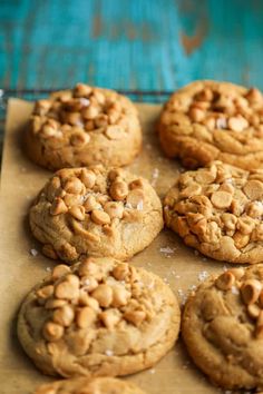 cookies with peanut butter and sea salt on a baking sheet, ready to be eaten