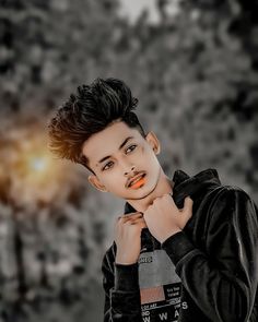 a young man with black hair and orange lipstick