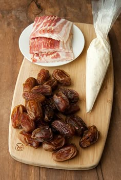 some food is sitting on a cutting board