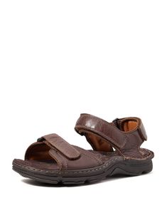 a brown leather sandal with two straps