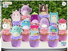 there are many cupcakes that have animals on them