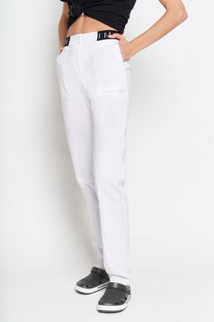 When you want a work wardrobe that's subtle, stylish, and elegant, make these scrubs pants a part of it! Fashionable uniform trousers like this will make any female doctor or a beautician look classy when at work. It combines functionality with an attractive appearance. Such skinny pants with the emphasis on the belt are an original option for the nurse uniform. Made of Italian stretchy cotton fabric they are very comfortable and fit perfectly. The pockets are quite roomy and functional. The pan White Stretch Straight Leg Cargo Pants, White Tapered Leg Work Pants, Fitted White Cargo Pants For Work, Stretch Full-length Cargo Pants For Work, Fitted Cargo Pants With Elastic Waistband For Work, White Tapered Leg Cargo Pants For Work, White Straight Leg Cargo Pants For Work, Uniform Trousers, Scrubs Pants