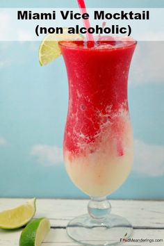 a red drink in a glass with limes around it and the words miami vice cocktail non alcoholic