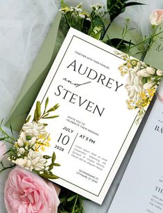 wedding stationery with flowers and greenery