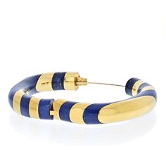 Imagine gifting your significant other a piece of fine jewelry that embodies the essence of elegance and craftsmanship. Introducing the Tiffany & Co. Platinum & 18K Yellow Gold Blue Lapis Inlay Bracelet. This exquisite piece showcases a seamless blend of platinum and 18K yellow gold, creating a harmonious contrast that captivates the eye.Crafted with love and attention to detail, this bracelet features a stunning blue lapis inlay, adding a touch of vibrant color and personality to the piece. The Blue Lapis, Significant Other, Estate Jewelry, Tiffany & Co., Types Of Metal, Timeless Elegance, Gold Metal, Platinum, Essence