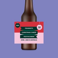 a bottle of beer with a label on the top that says frankie's christmas cheer festive beer