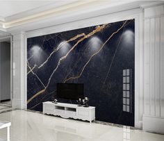 a large marbled wall in a living room next to a white table and chair