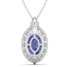 This elegant oval-shaped pendant features a stunning tanzanite surrounded by sparkling diamonds, creating a timeless and sophisticated piece of jewelry. Perfect for adding a touch of glamour to any outfit, this pendant is sure to make a statement and become a cherished addition to any jewelry collection. Metal: 14K Gold Setting Type: Prong Rhodium Finish: Yes, on White Gold Gemstone Details: Gemstone: Tanzanite Shape: Oval Average Dimensions: 11.55 x 8.88 MM Quantity: 1 Average Cut: Very Good Av Elegant Oval Tanzanite Necklaces, Elegant Tanzanite Oval Pendant Jewelry, Elegant Tanzanite Oval Pendant Necklace, Dance Jewelry, Birthstone Gifts, Ring Pendant Necklace, Sparkle Diamonds, Mens Wedding Bands, Bridal Rings