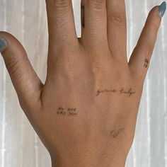 a woman's hand with writing on it that says, you are the one