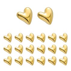 gold heart shaped magnets are arranged in rows on a white background with clipping for text