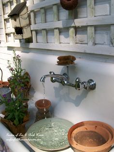 a bathroom sink with water running from the faucet