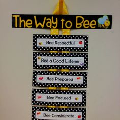 the way to bee bulletin board is decorated with black and white polka dots, yellow ribbon