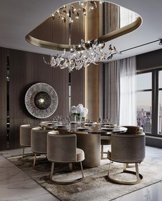 an elegant dining room with chandelier and round table